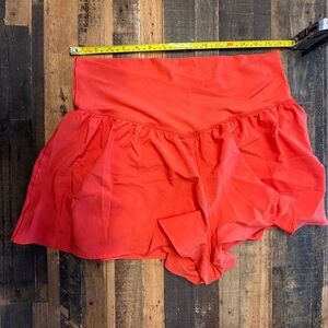 offline by aerie real me crossover flowy short, spandex & pocket inside.